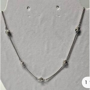 AVON Elegant Silver Knot Necklace